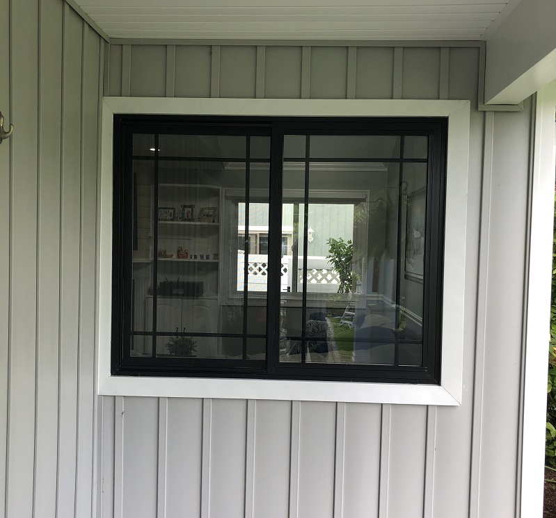 Andersen 100 Series Sliding Window prairie grids